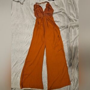 Blashe Elegant burnt orange or rust-colored lace-top wide-leg jumpsuit